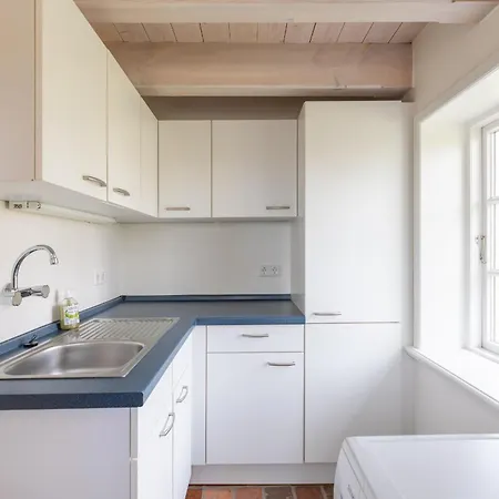 Holiday home Hyggehues Risum-Lindholm